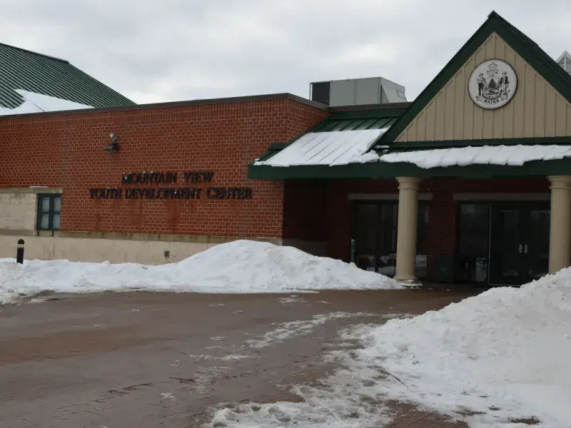 Institutional building exterior signifying environments where abuse may have occurred and where Maine survivors may pursue legal accountability.
