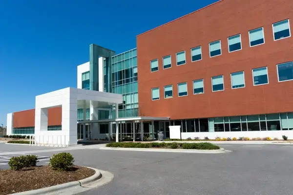 Exterior of a psychiatric hospital representing mental health institutions where abuse may occur.
