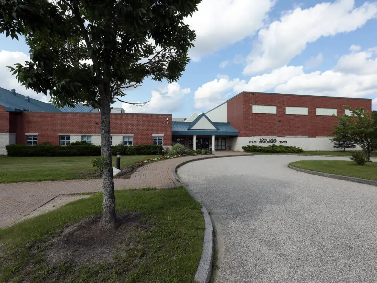 Institutional facility building representing settings where survivors may qualify for legal action and abuse claims.